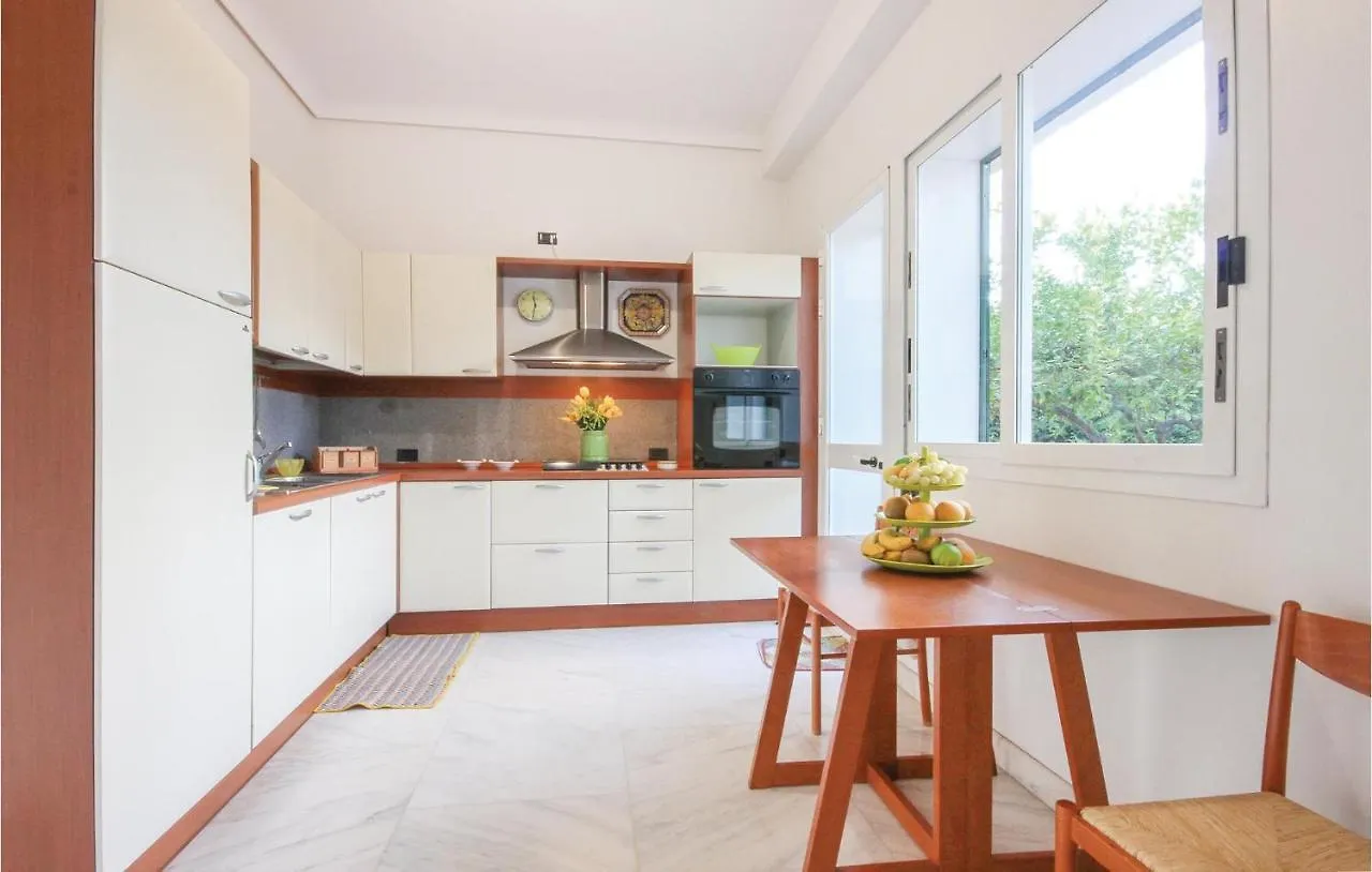 Дом отдыха Green House Комизо Италия